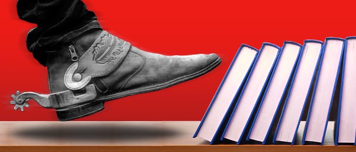 Boot kicking over books